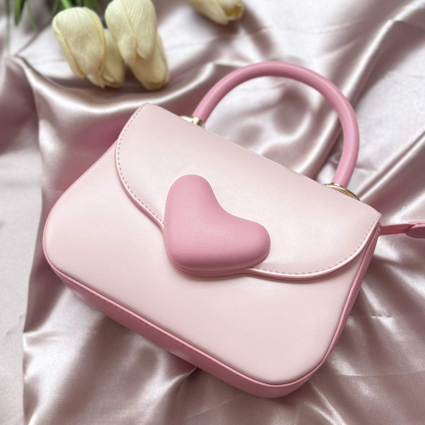 The Cupid Charm Sling Bag, Pink