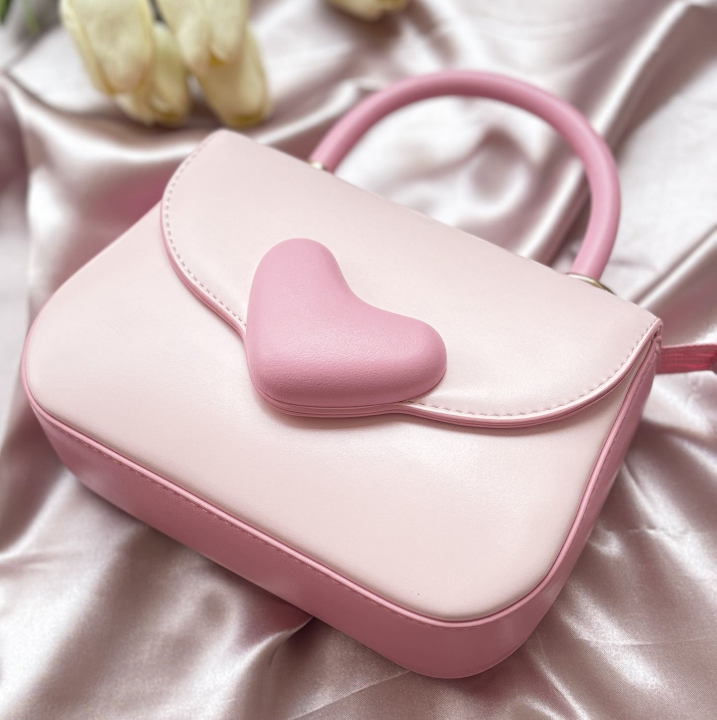 The Cupid Charm Sling Bag, Pink